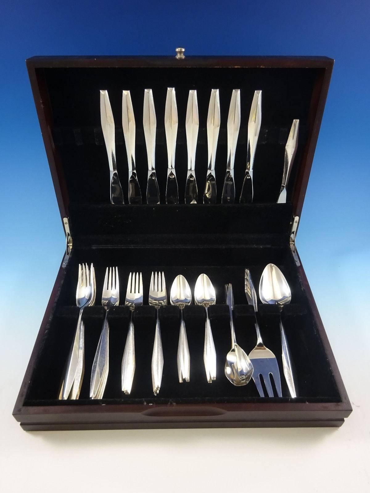 Diamond by Reed and Barton sterling silver flatware set - 36 pieces. This set includes: Eight knives, 8 7/8