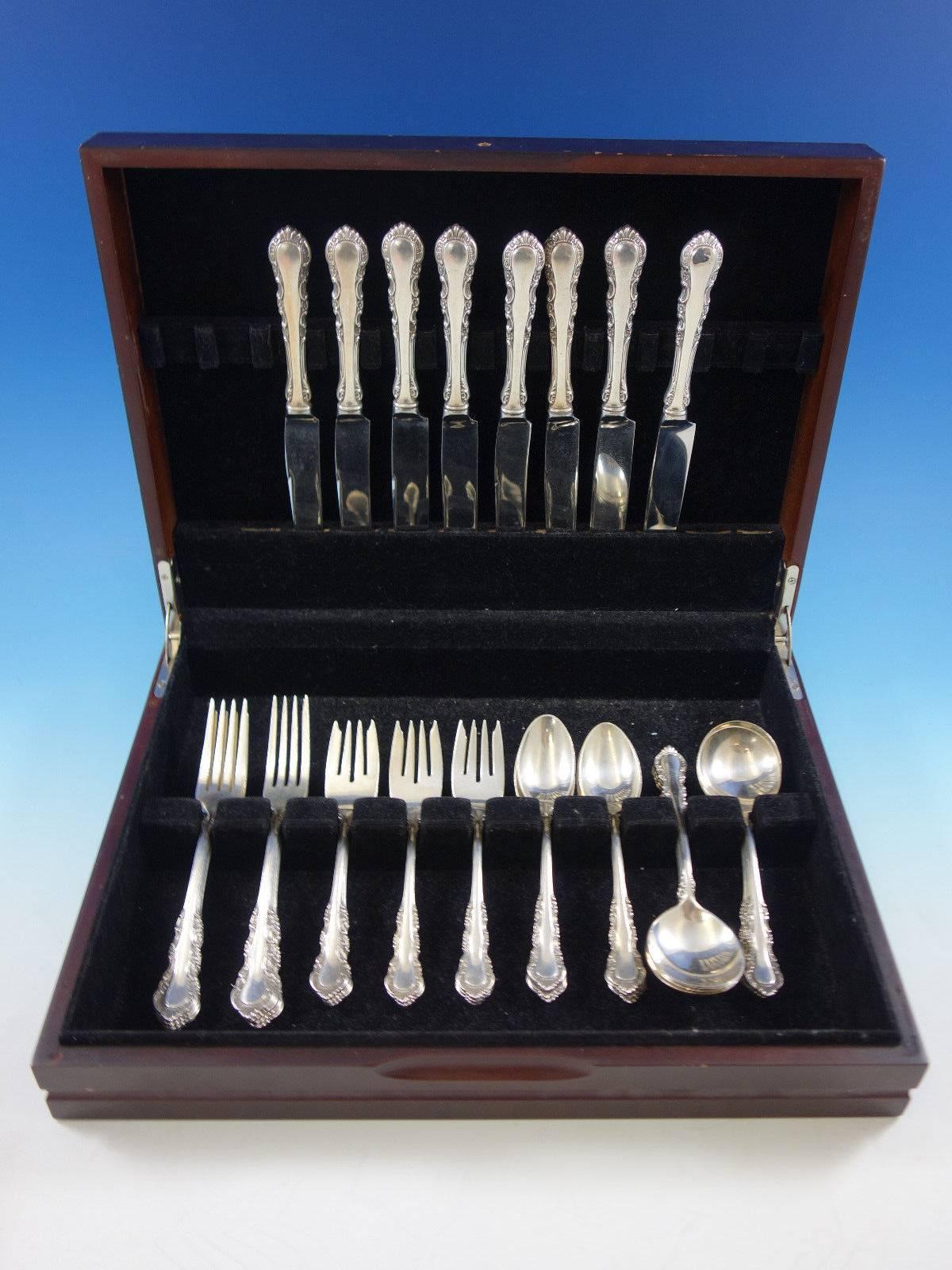 Georgian Rose by Reed and Barton sterling silver flatware set of 40 pieces. This set includes: 

Eight knives, 9