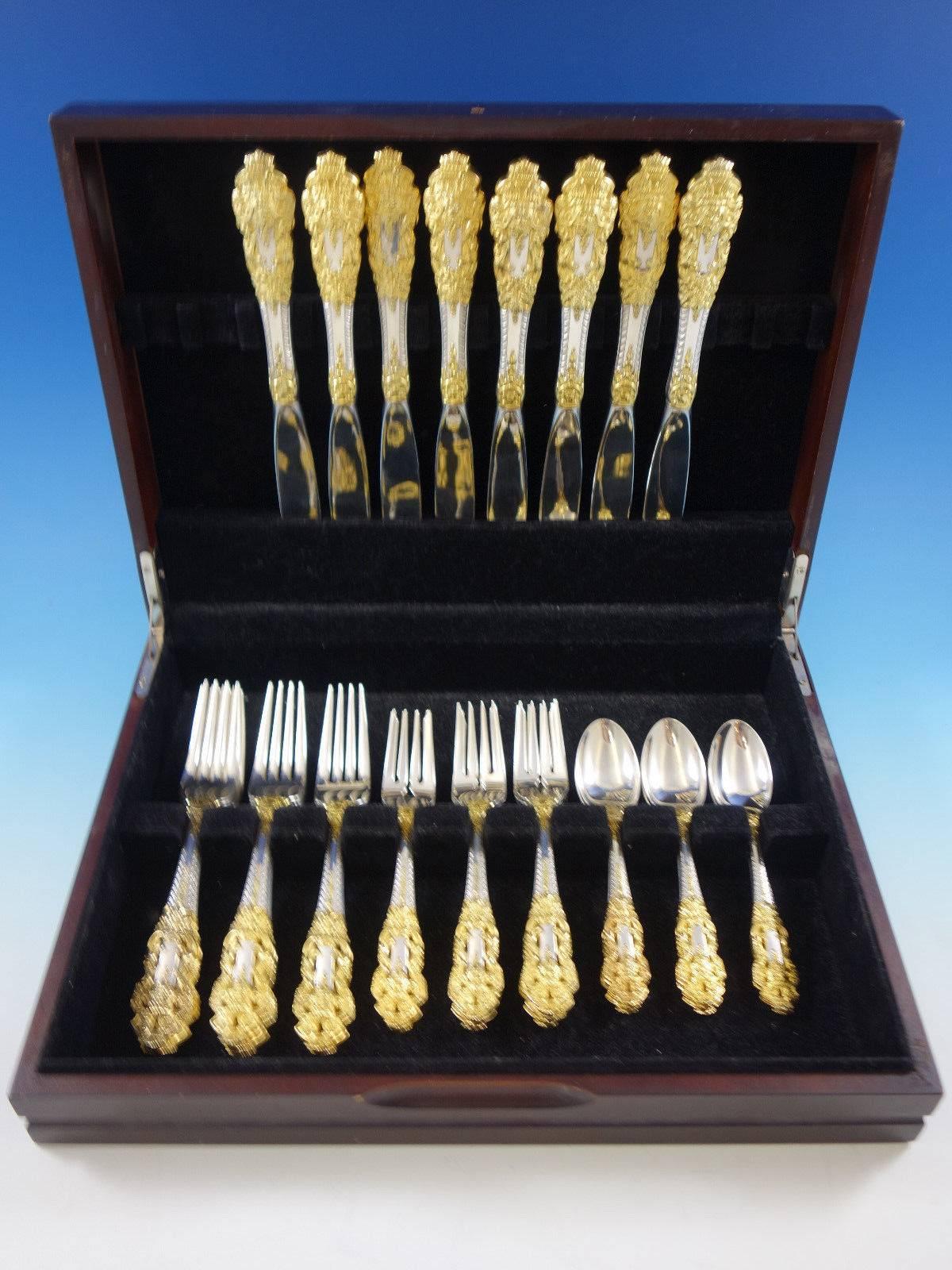 Golden crown Baroque by Gorham sterling silver and partial gilt flatware set, 32 pieces. This set includes: Eight large dinner knives, 9 7/8", eight large dinner forks, 8", eight salad forks, 6 3/4", eight teaspoons,