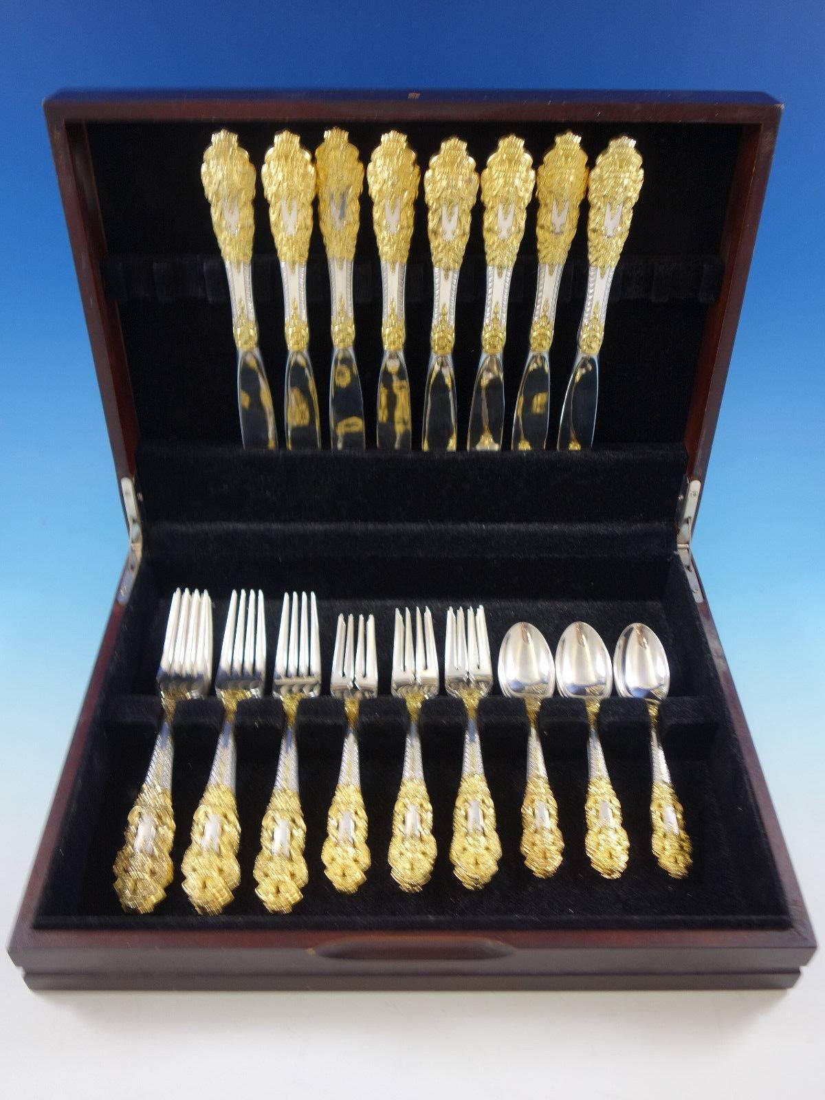 Golden crown Baroque by Gorham sterling silver and partial gilt flatware set, 32 pieces. This set includes: Eight large dinner knives, 9 7/8", eight large dinner forks, 8", eight salad forks, 6 3/4", eight teaspoons,