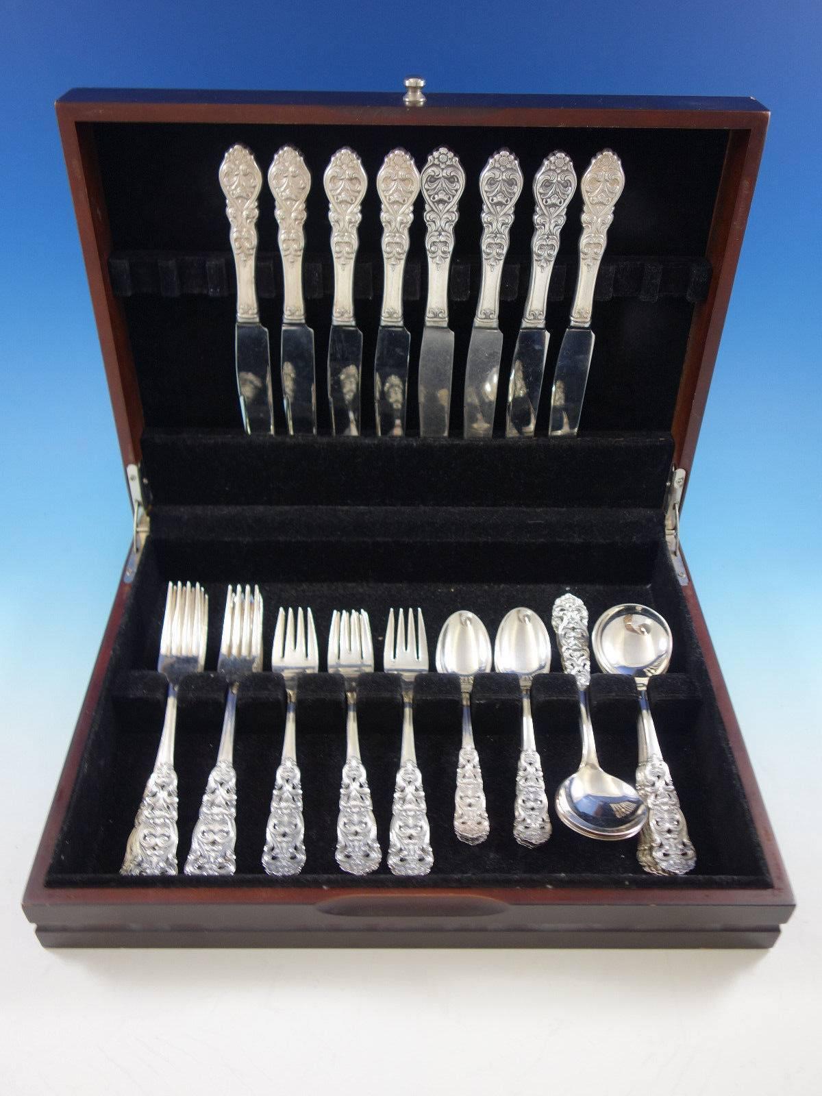 Valdres by Th. Marthinsen (Norway) sterling silver flatware set with ornate pierced handle, 40 pieces. This set includes: Eight dinner size knives, 9 1/2
