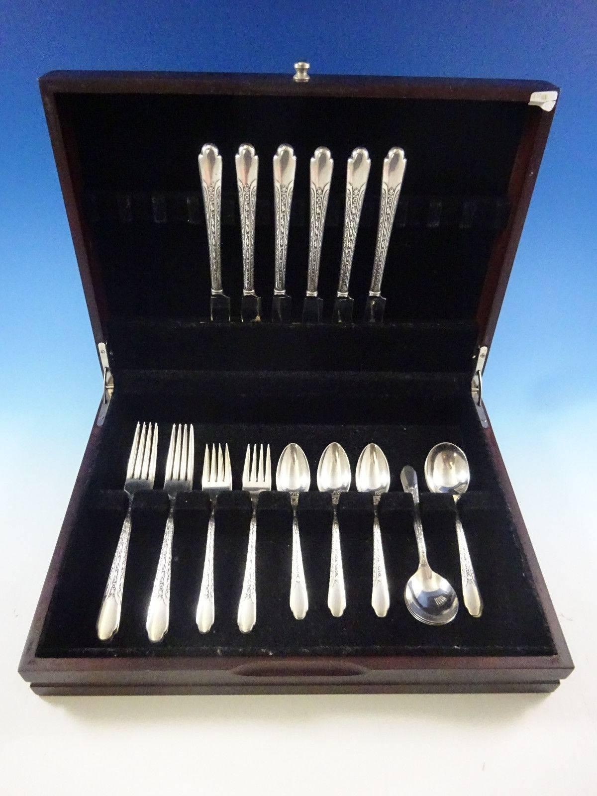 Elegance by International sterling silver grille size flatware set 30 pieces. This set includes: 

six grille size knives, 8 1/2