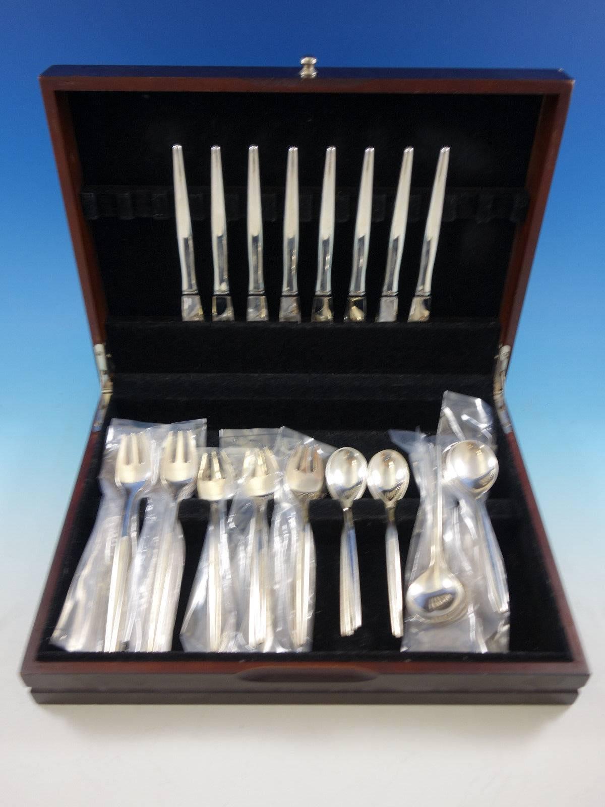 Mid-Century Modern Tulip by Michelsen Danish sterling silver flatware set, 40 pieces. This set includes: Eight knives, 8 1/2