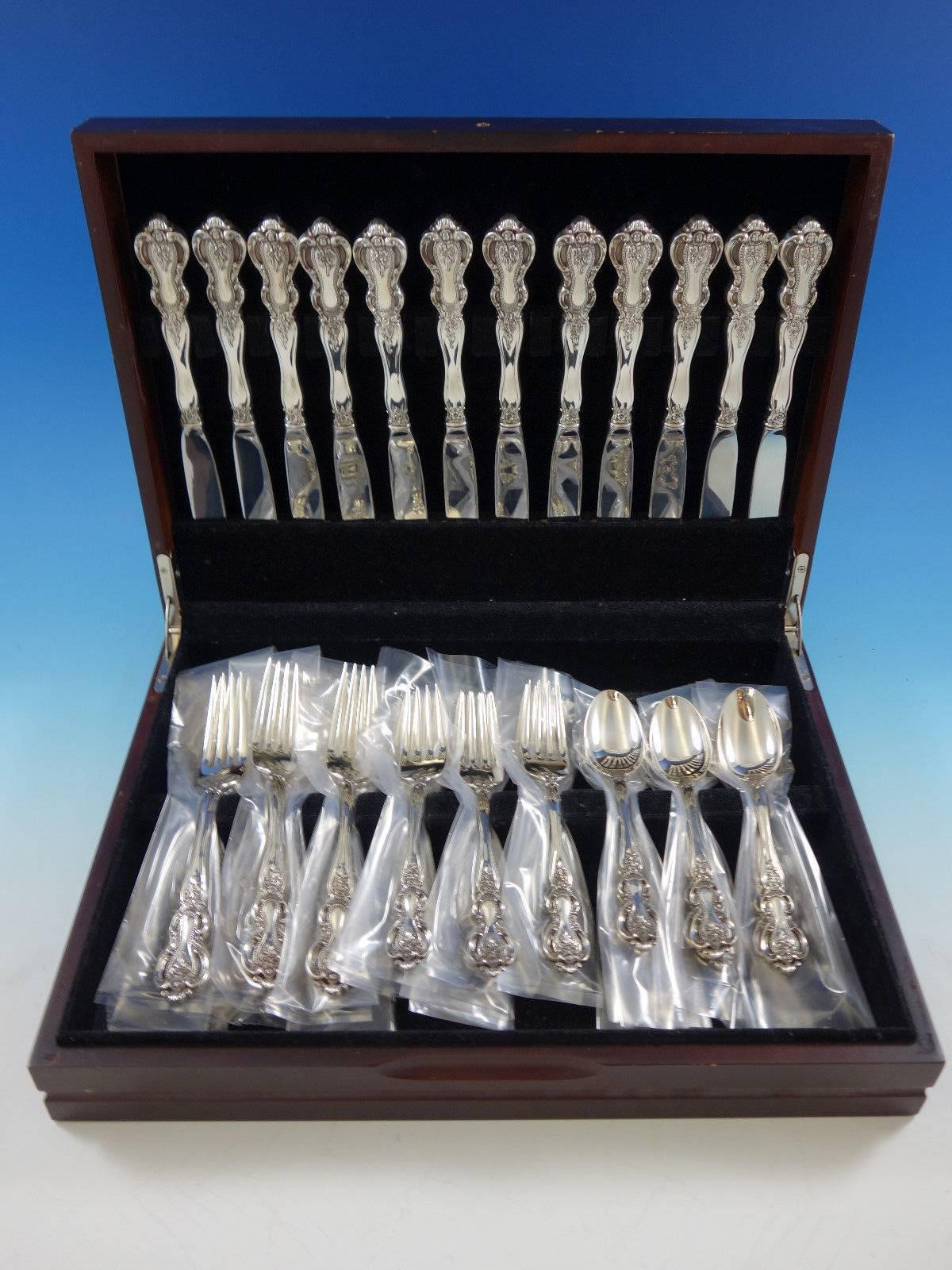 Beautiful Belle Auberge by Kirk sterling silver flatware set - 48 pieces. This set includes: 

12 knives, 8 7/8