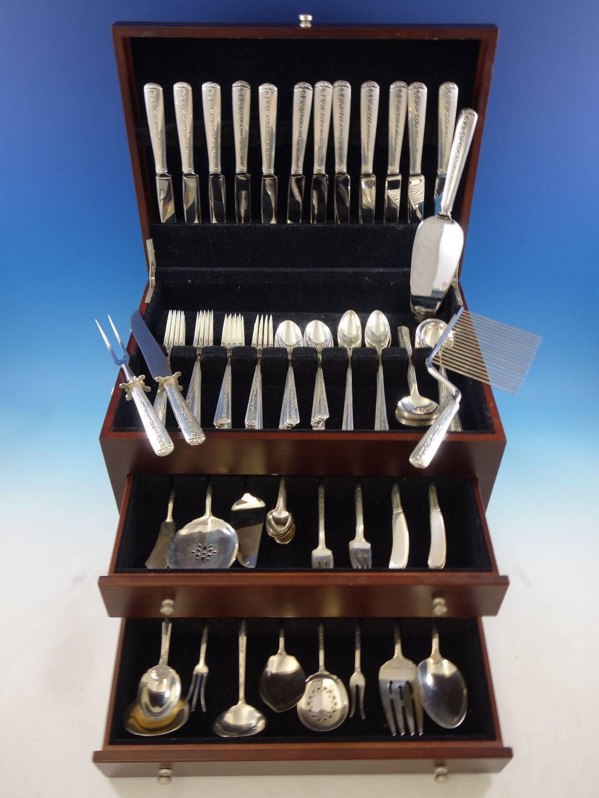 Rambler rose by Towle sterling silver flatware set, 124 pieces. This set includes: 12 knives, 8 3/4