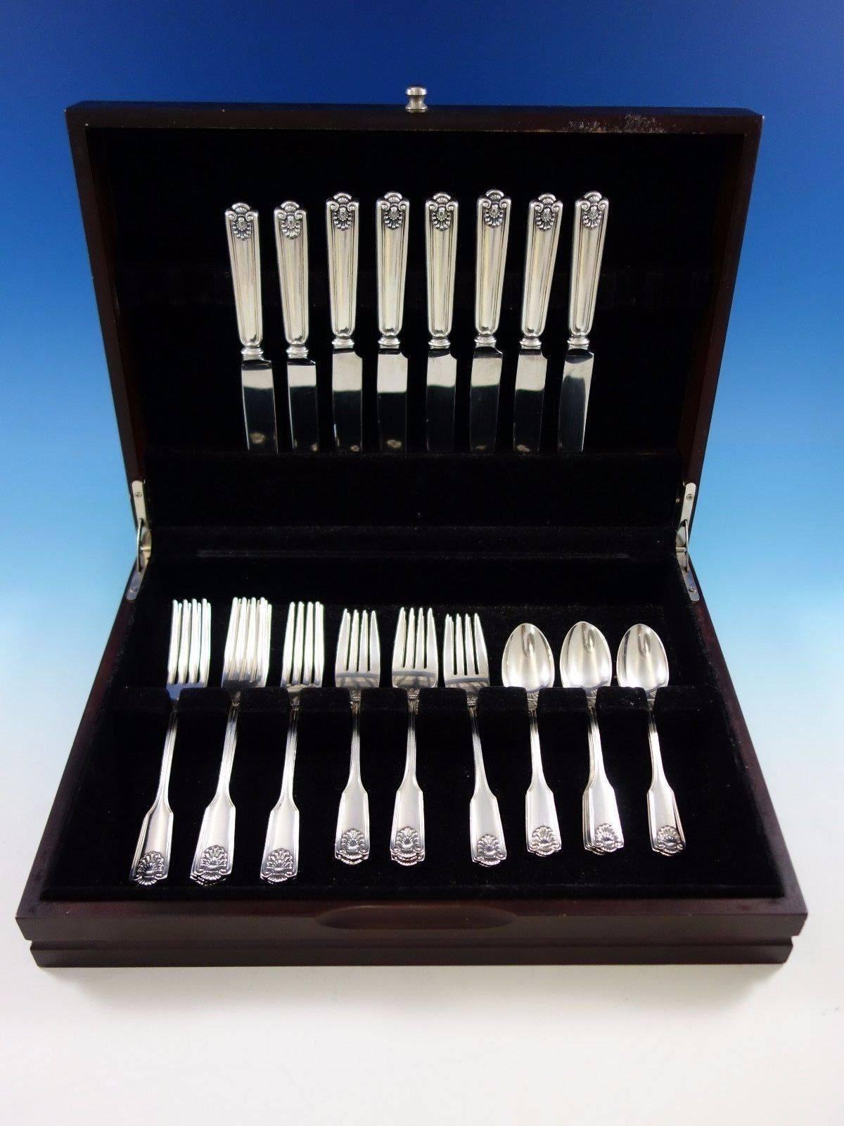 Fiddle shell by frank smith sterling silver flatware set, 32 pieces. This set includes: 

Eight knives, 8 1/2