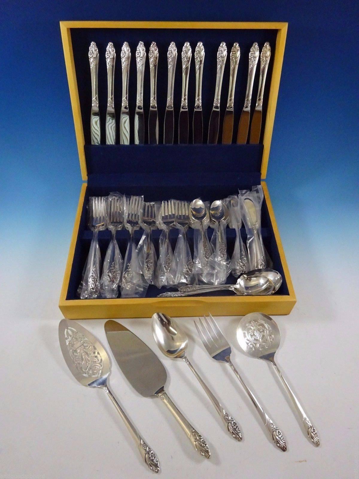 Evening star by community plate silver plate flatware set, 69 pieces. This set includes: 

12 dinner knives, 9 1/4