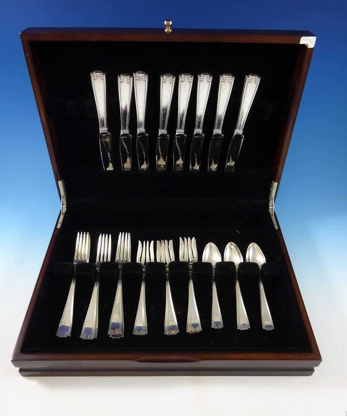 Etruscan by Gorham Sterling Silver flatware set 32 pieces. This set includes: 

Eight knives, 8 3/4