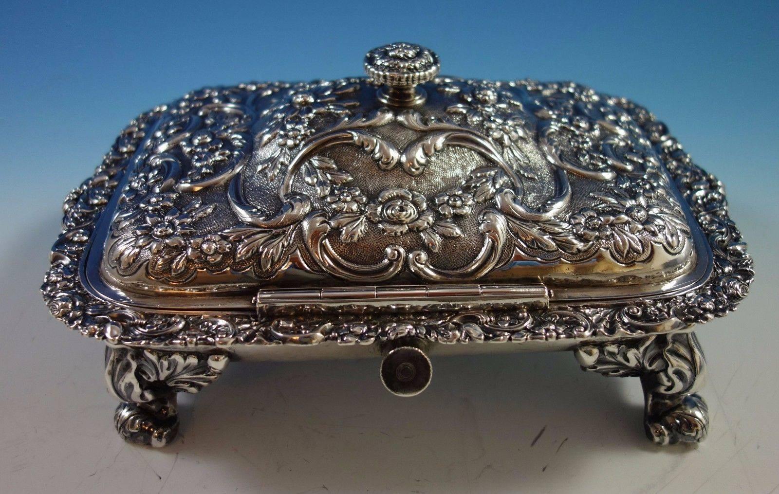 Repousse by Alexander Edmonstoun III:
Gorgeous repousse sterling silver footed dish aka Scottish cheese warmer (Brie) made by Alexander Edmonstoun III. This dish is not monogrammed and features a hinged lid, a spigot for hot water, and a beautiful
