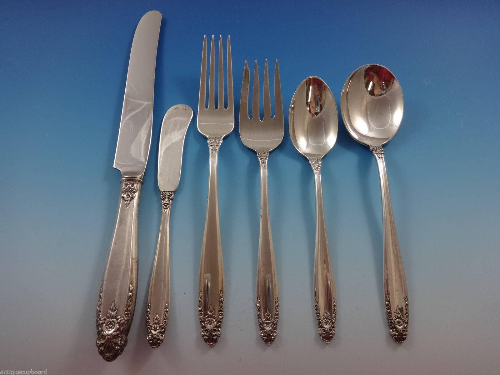 Prelude by International sterling silver flatware set. This set includes: 

Eight knives, 9 1/4