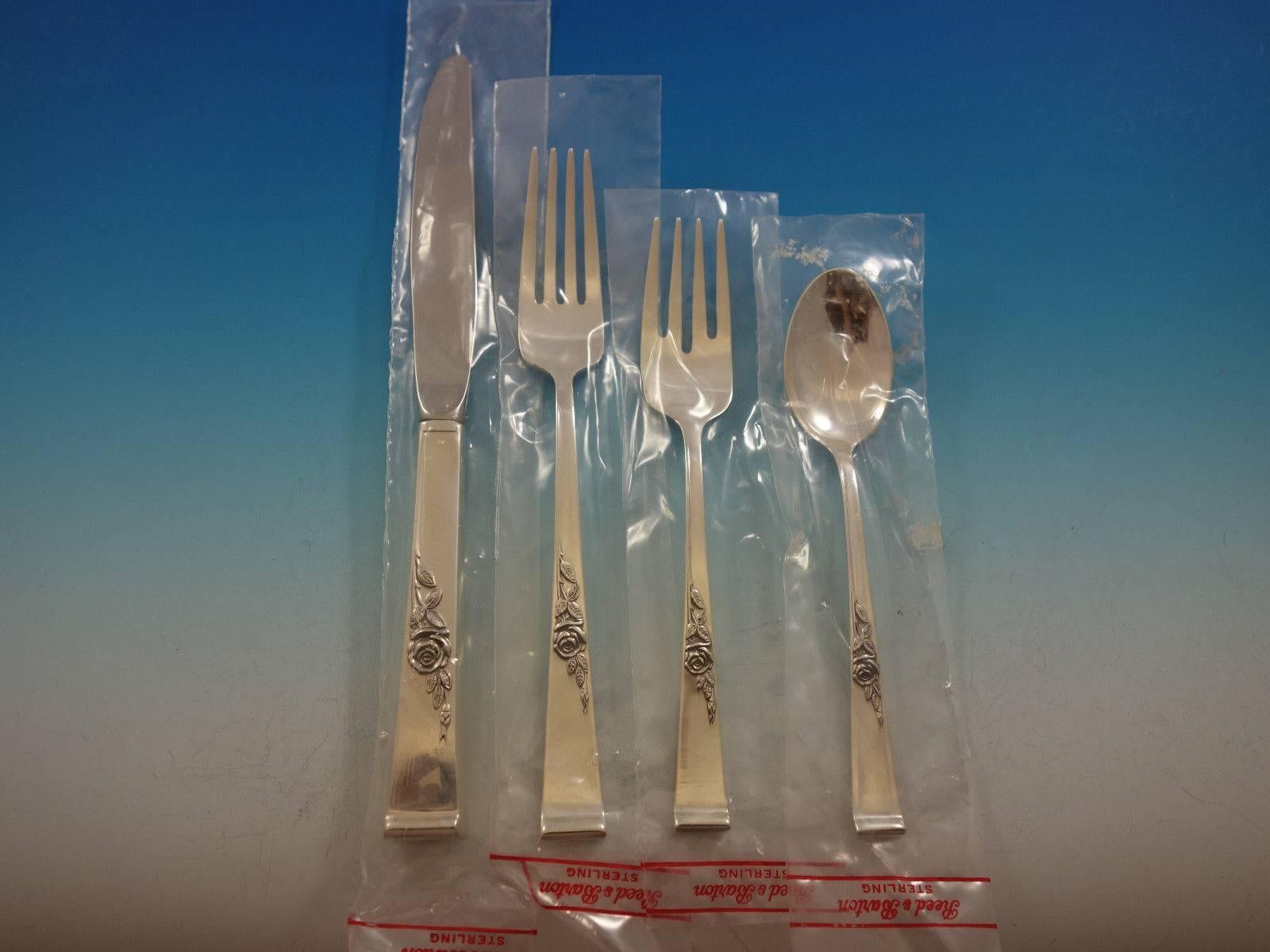 New, unused Classic rose by Reed & Barton sterling silver flatware set, 48 pieces. This set includes: 

12 knives, 9 1/8