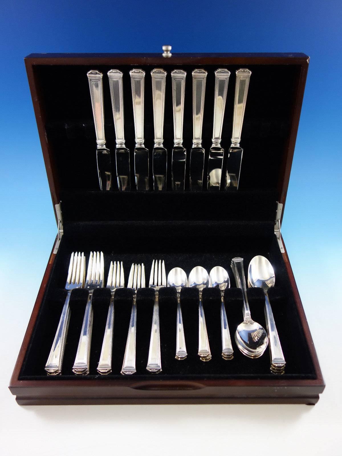 Dinner size Pantheon by Tuttle sterling silver flatware set, 40 pieces. This set includes: Eight dinner size knives, 9 1/2