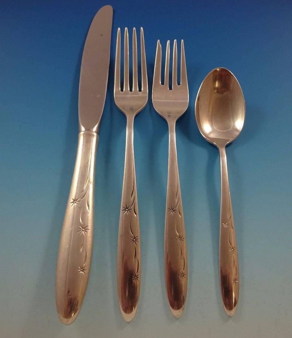 Celeste by Gorham, circa 1956, sterling silver flatware set of 57 pieces. This set includes: 

Eight knives, 9 3/8