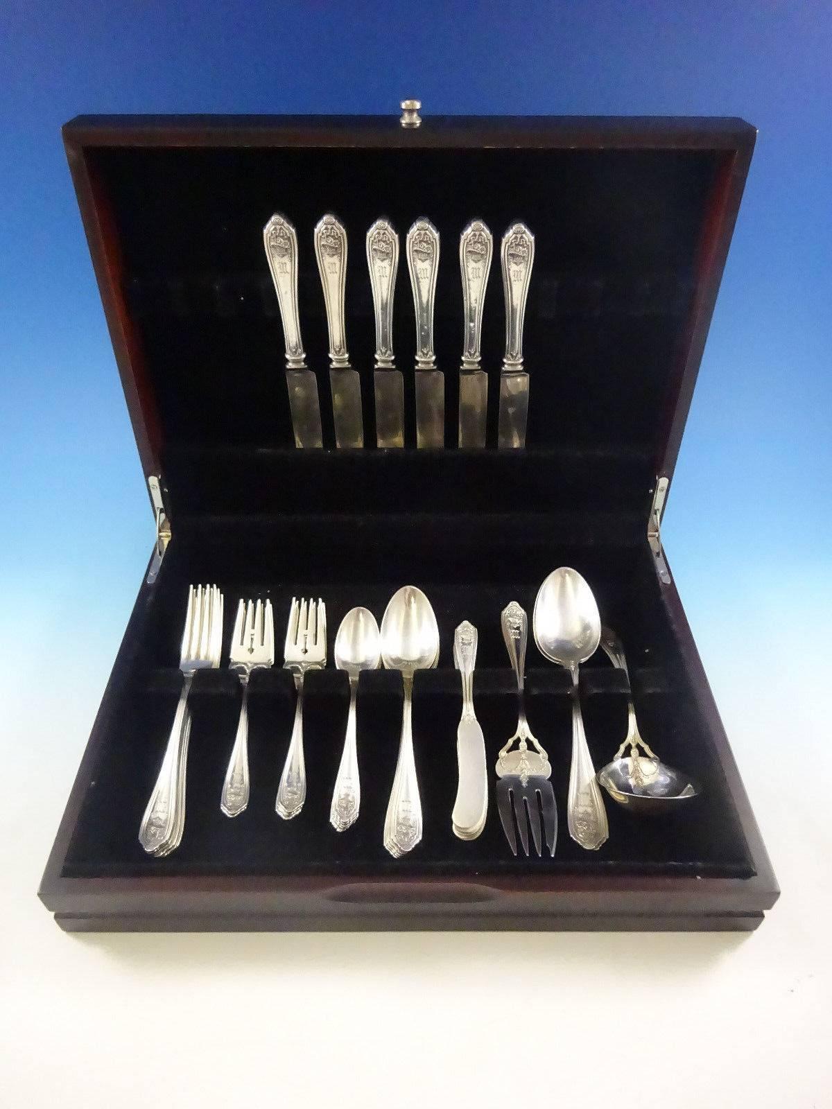 Basket of flowers by Dominick & Haff sterling silver flatware set, 40 pieces. This set includes: 

six knives, 8 1/2