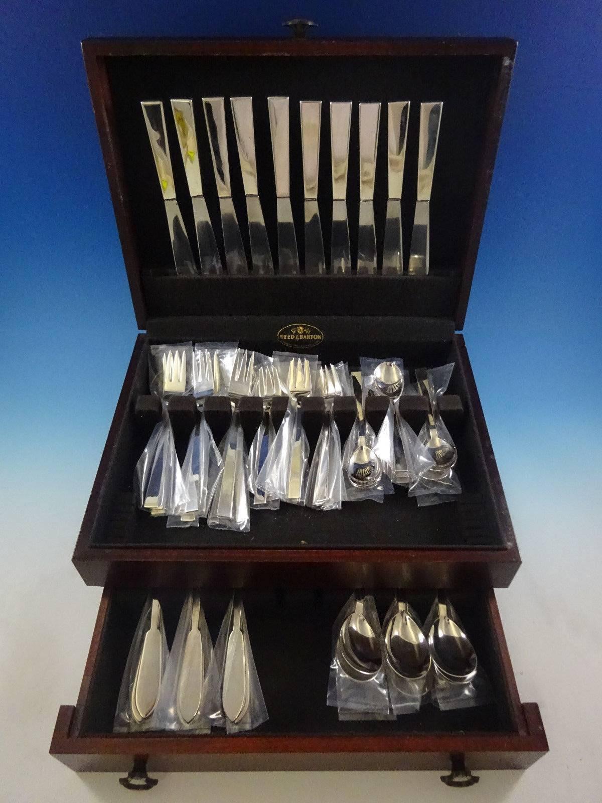 Moderne by Adra sterling silver flatware set of 60 pieces. This set includes: 

Ten dinner knives, 9 1/8