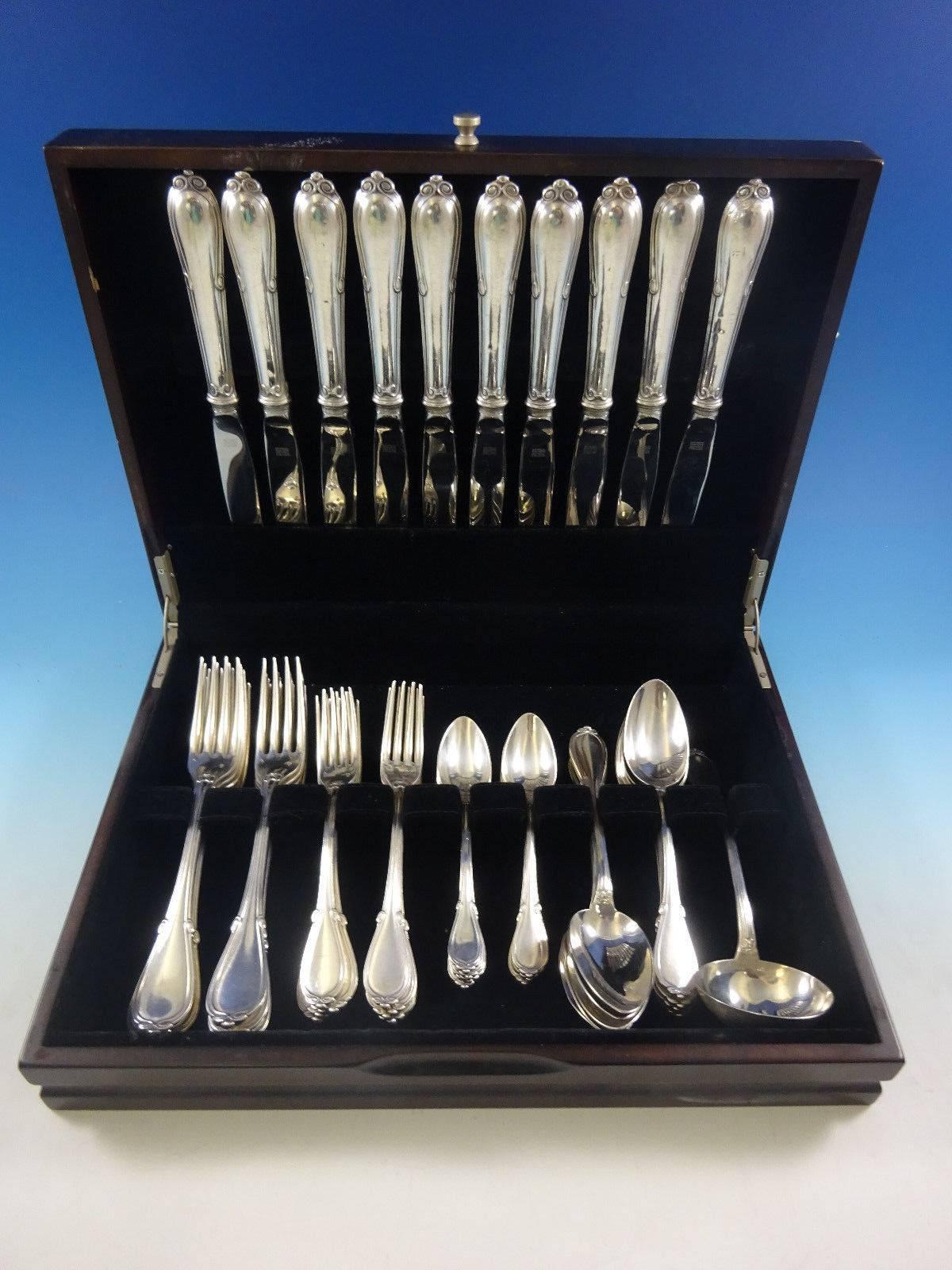 Dinner size Fontenelle by Odiot France 950 sterling silver flatware set, 51 pieces. This set includes: 

ten dinner size knives, 10