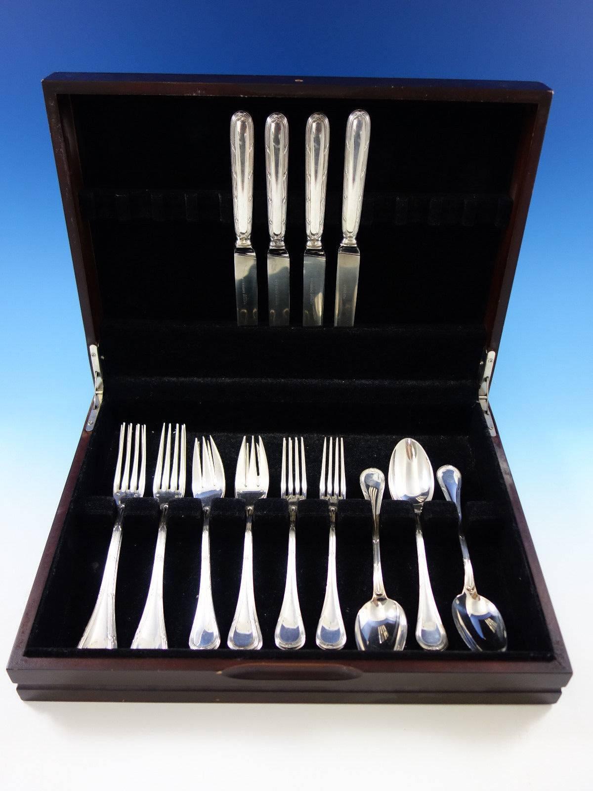 Scarce dinner size Bougainville by Puiforcat France, retailed by Cartier, sterling silver flatware set of 20 pieces. Great starter set! This set includes: 

Four dinner size knives, 9 1/2
