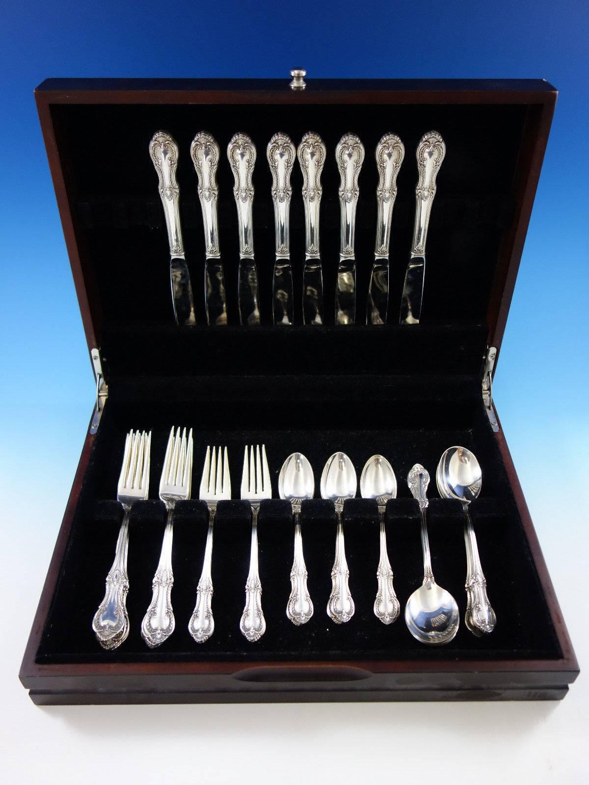 Lambeth Manor by International sterling silver flatware set of 40 pieces. This set includes: 

Eight knives, 9 1/4