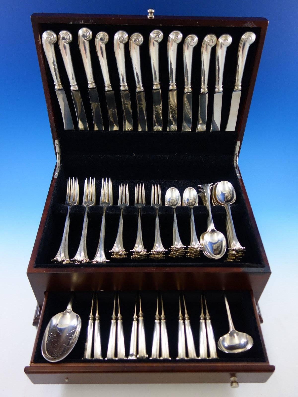 Dinner size scroll by James Robinson sterling silver flatware set, 74 pieces. This set includes: 

12 dinner size knives, pistol grip, 9 1/2