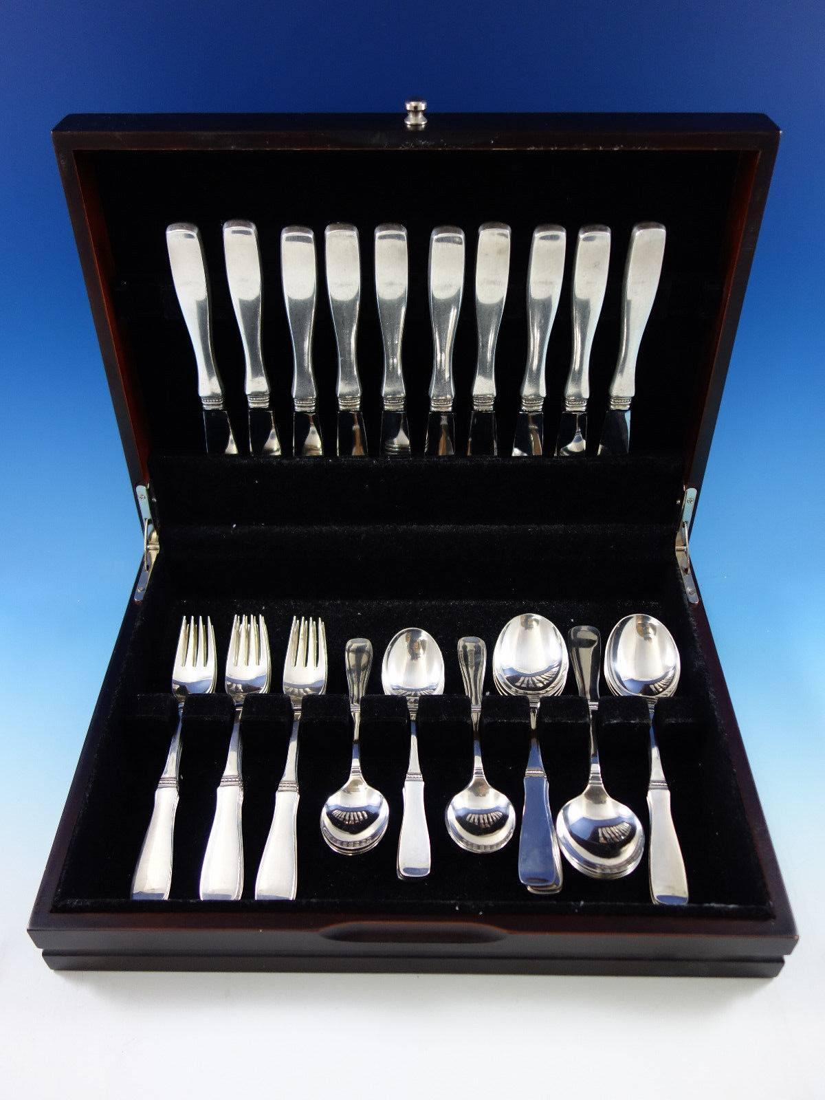 Scandinavian Modern Swedish silver flatware set by Markstroms Guldsmeds, with 1961 date mark - 40 pieces. This set includes: 

Ten knives, 8 5/8