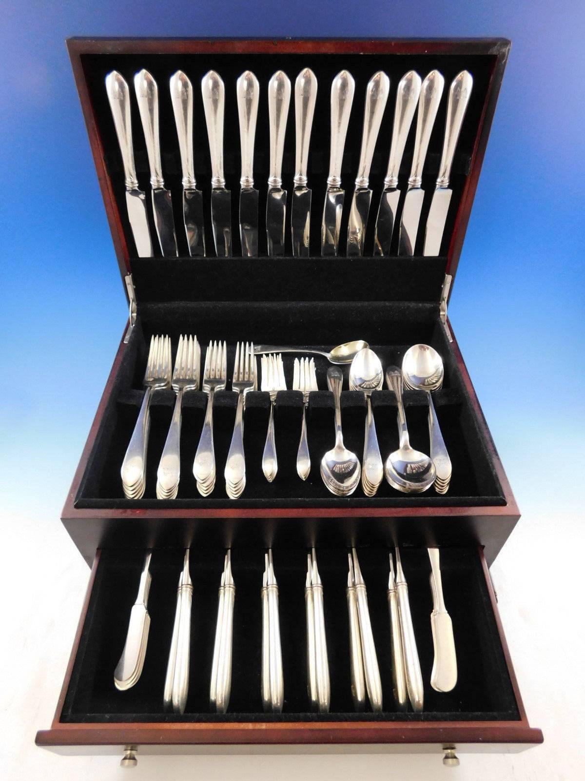 Large Dinner & luncheon Gorham Plain by Gorham sterling silver Flatware set with wild boar crest, 95 pieces. This set includes: 12 Dinner Size Knives, 9 7/8
