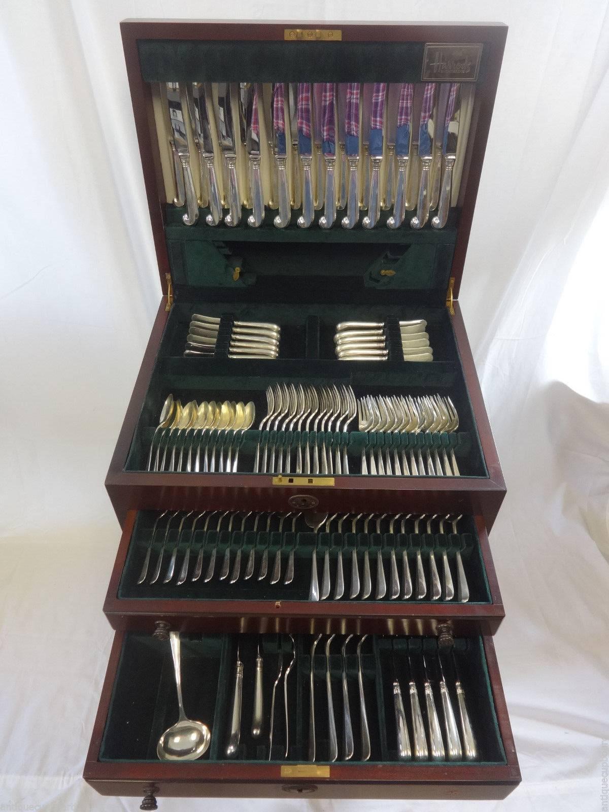 Massive exceptional RAT TAIL RATTAIL by TIFFANY & CO. (MADE IN ENGLAND) sterling silver Flatware set - 157 pieces in LARGE fitted chest by Harrods of Knights Bridge with stand. This set includes:

12 DINNER SIZE KNIVES, 9 3/4