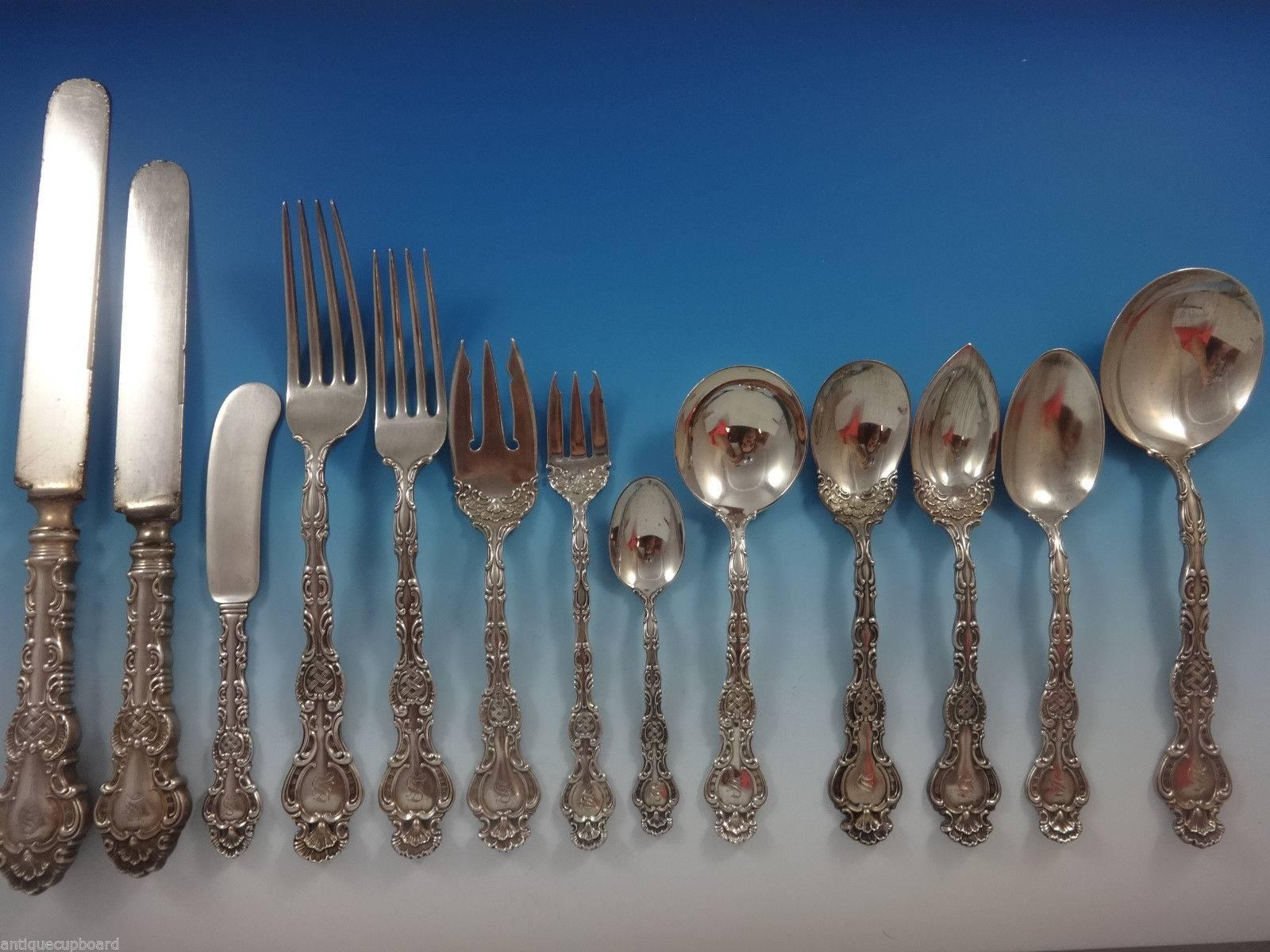 Huge rare regent by Durgin sterling silver dinner and luncheon flatware set of 161 pieces. This is an exceedingly rare pattern with unusual pierced handle and beautiful servers. Many of the serving pieces have bright-cut ribbons on the shoulders.