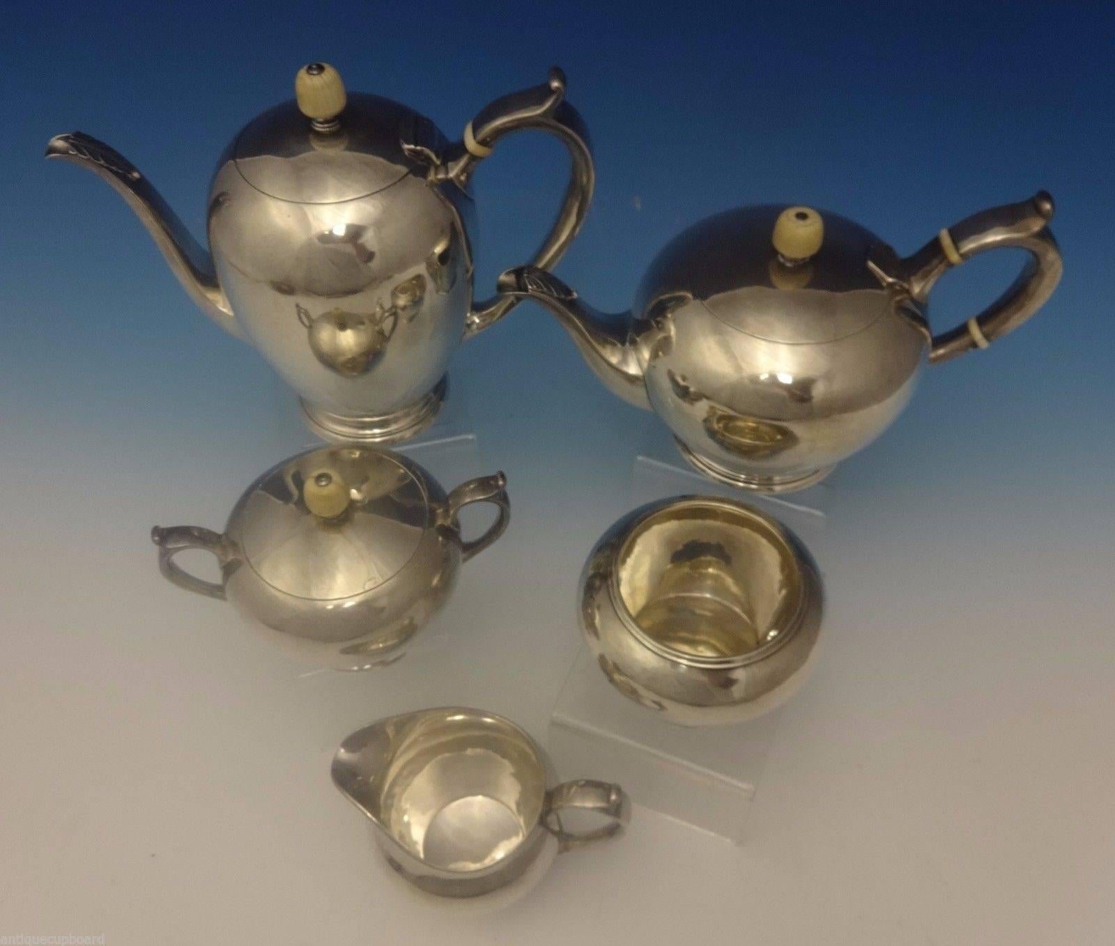 Arthur Stone.

Arthur Stone is highly regarded for the fine handwrought silver produced by him personally and by the workshop he started in 1901. His shop employed and trained many fine silversmiths who later established their own shops, like