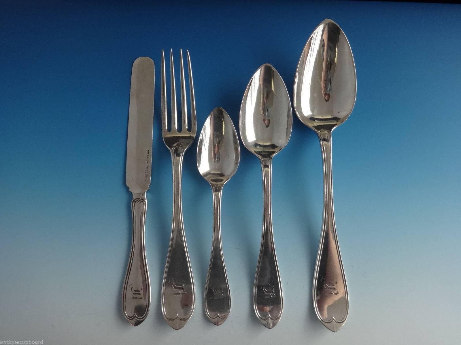 Early coin silver flatware set in fitted box by William Marsh. This set was presented to the head of the Old Astor House, Parker Jones, New York in the year 1859.

12 knives, flat handle, all-sterling, 7 3/4