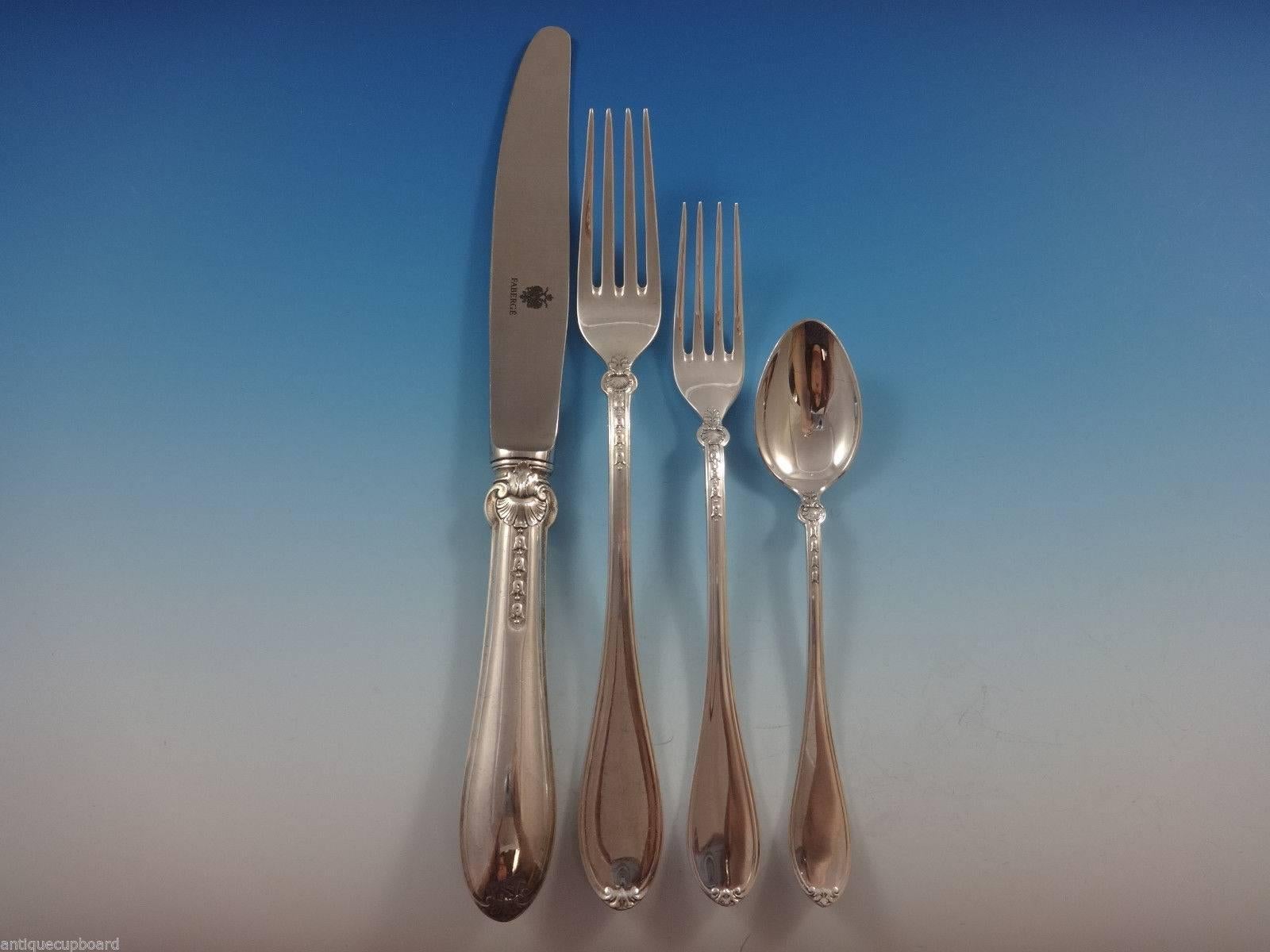 ‘Gatchina palace by Faberge' sterling silver flatware set of 50 pieces. Fabergé is known as the most revered name in luxury. This set includes:

Ten dinner size knives, 9 3/4