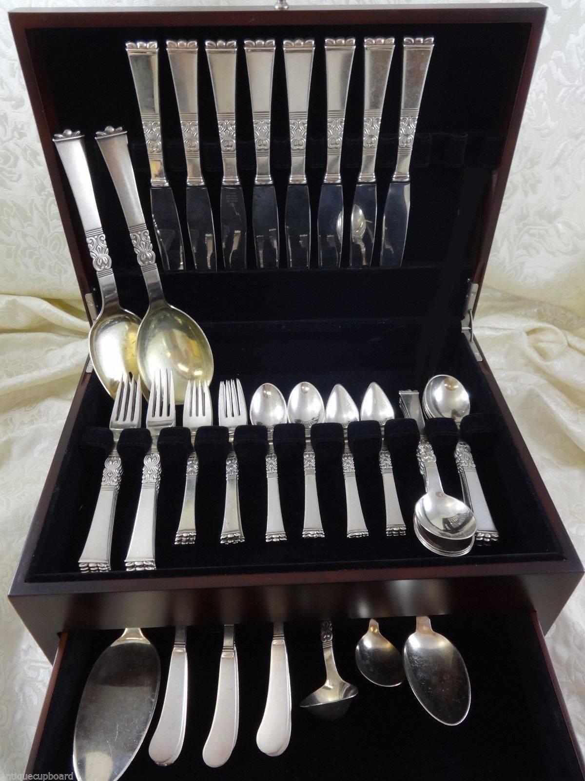 Stunning Rigs by Frigast Silversmiths of Copenhagen, Denmark sterling silver flatware set of 60 pieces. This set includes:

Eight dinner size knives, 9 3/4