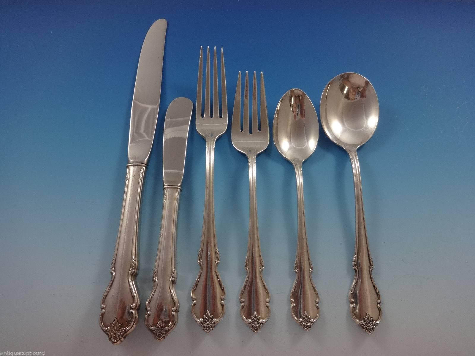 Stunning Breton Rose by International sterling silver flatware set of 72 pieces. This set includes:

12 knives, 9 1/4