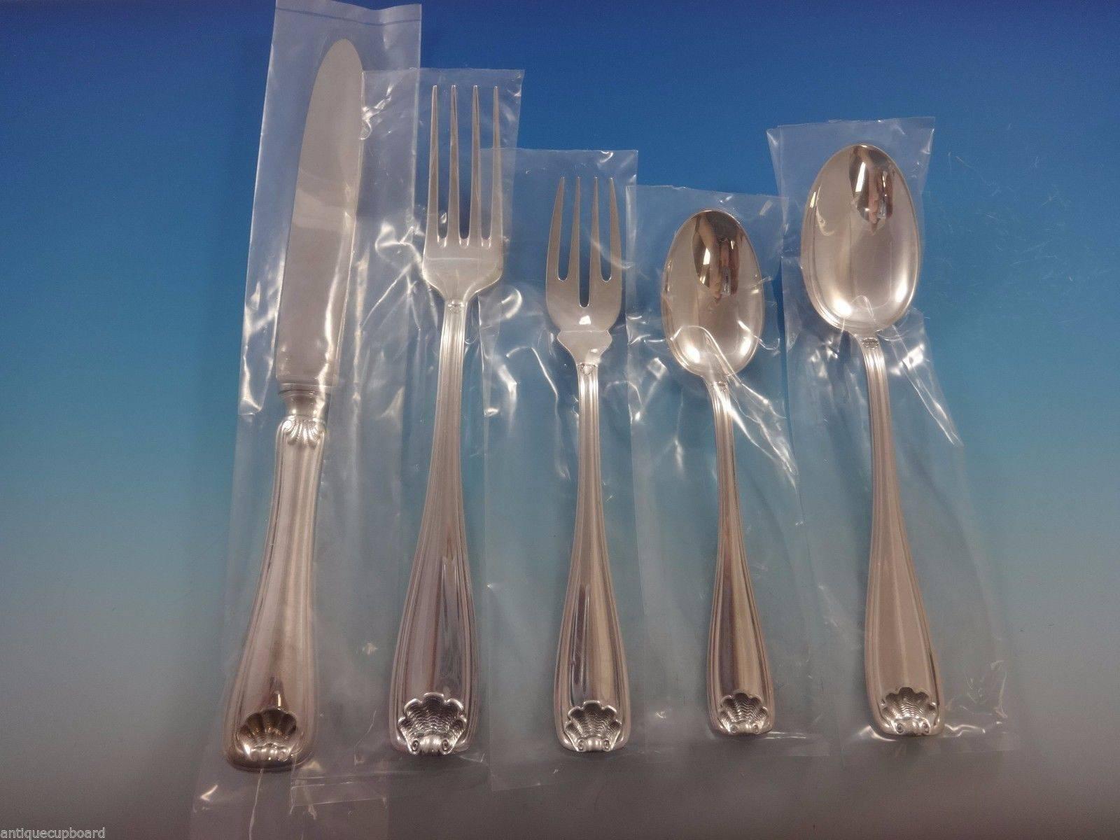 This exceptional 77 piece dinner size sterling silver Cellini by (Ricci) Fortunoff set includes:

12 dinner size knives, 9 1/2