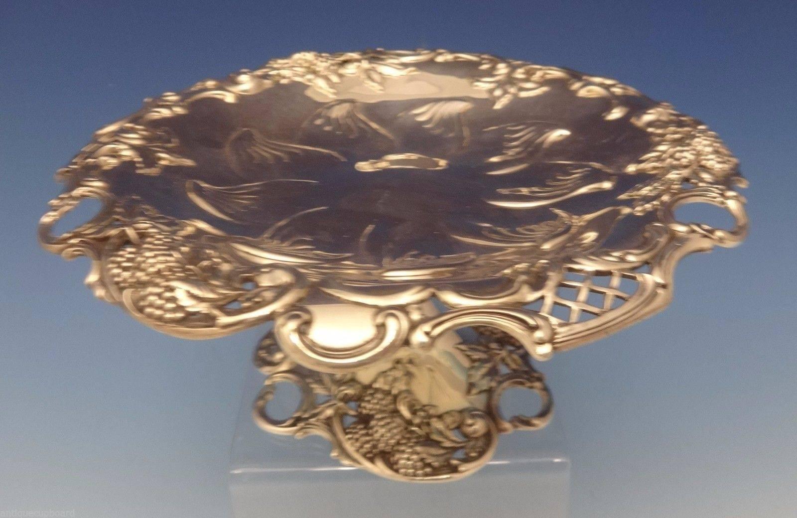 Stunning Blackberry by Tiffany & Co. sterling silver tazza.  It features a border of raised blackberries with leaves and pierced lattice.  The center is repoussed with stylized leaves.  The base is also decorated with blackberries.  It was retailed