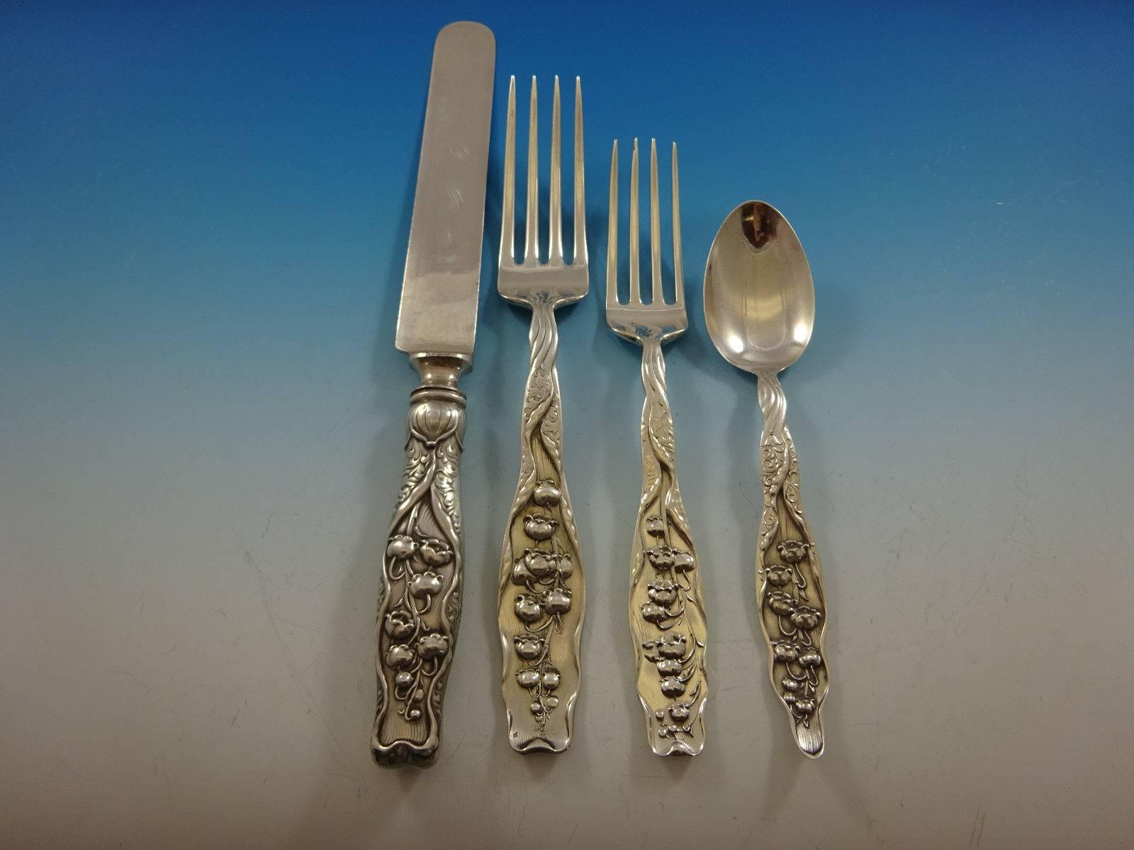 Art Nouveau, lily of the valley by whiting, circa 1885, sterling silver dinner size flatware set of 48 Pieces. This set includes:

12 dinner size knives, 9 5/8
