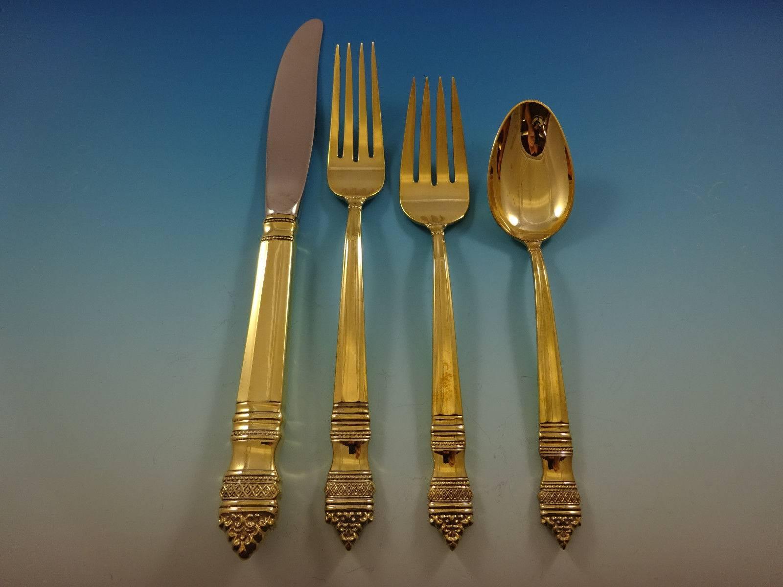 Danish baroque gold by Towle sterling silver flatware set - 48 pieces. Make a bold statement on your table with gold! This set is vermeil (completely gold-washed over sterling silver) and includes:

12 knives, 9