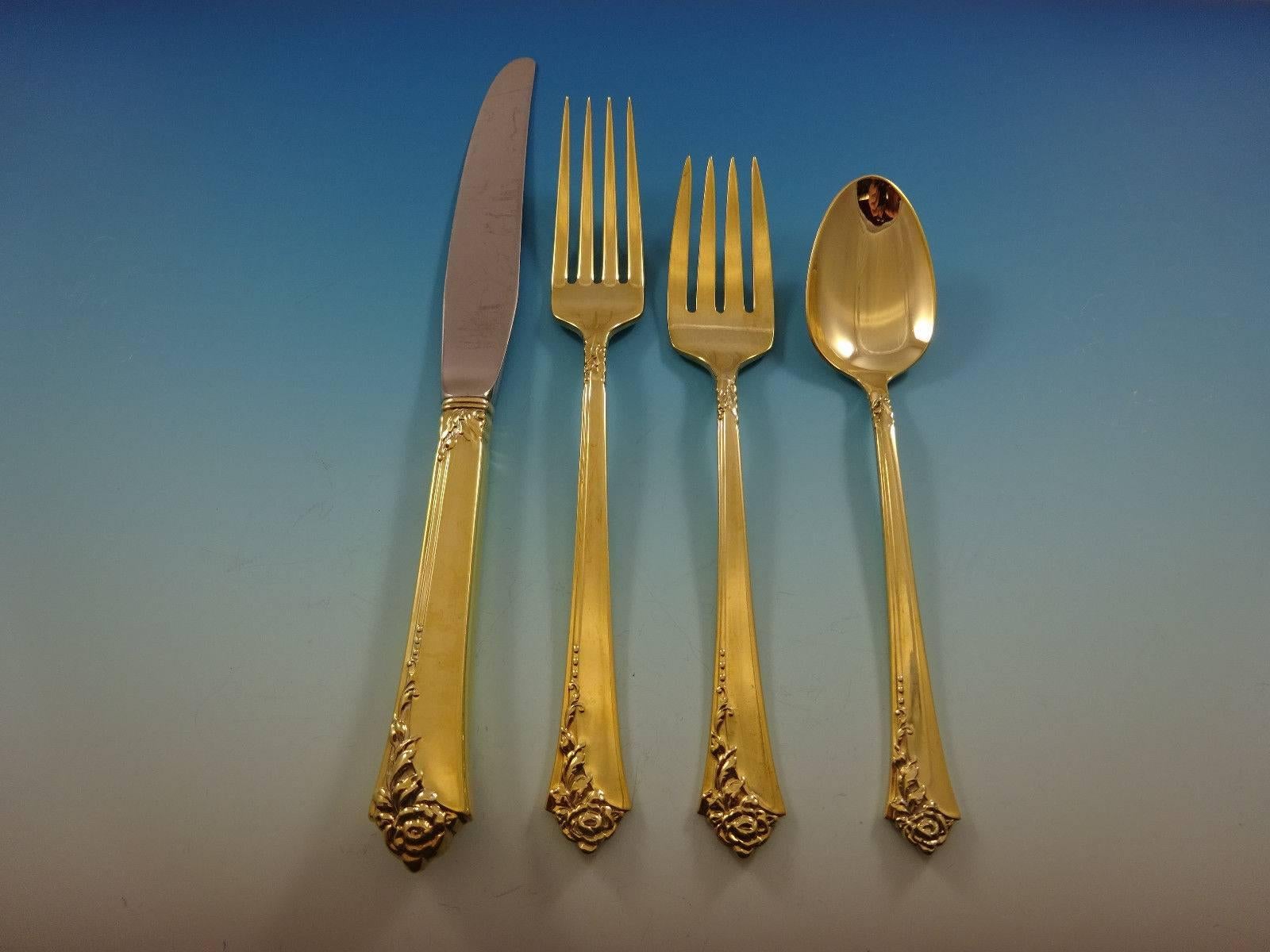 Damask rose gold by Oneida sterling silver flatware set of 48 pieces. Gold flatware is on trend and makes a bold statement on your table. This set is vermeil (completely gold-washed over sterling silver) and includes:
 
12 Knives, 8 7/8