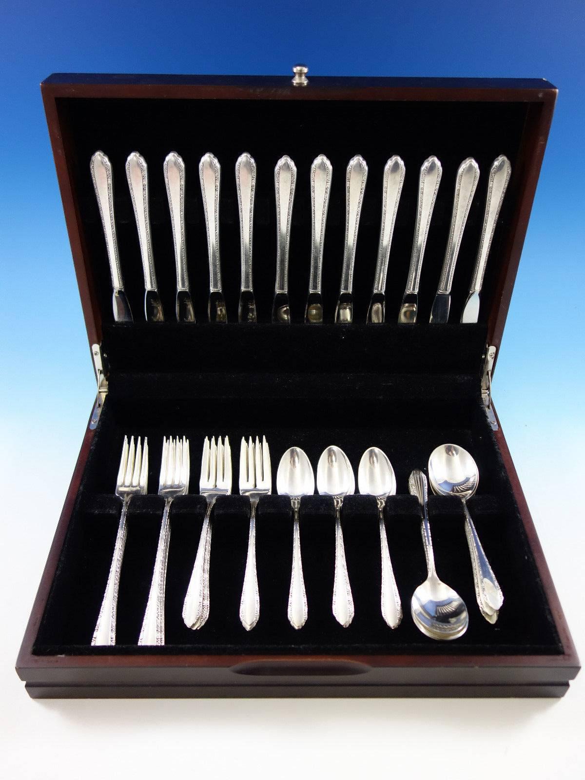 This set includes:

12 Grille size knives (with long handle), 8 1/4