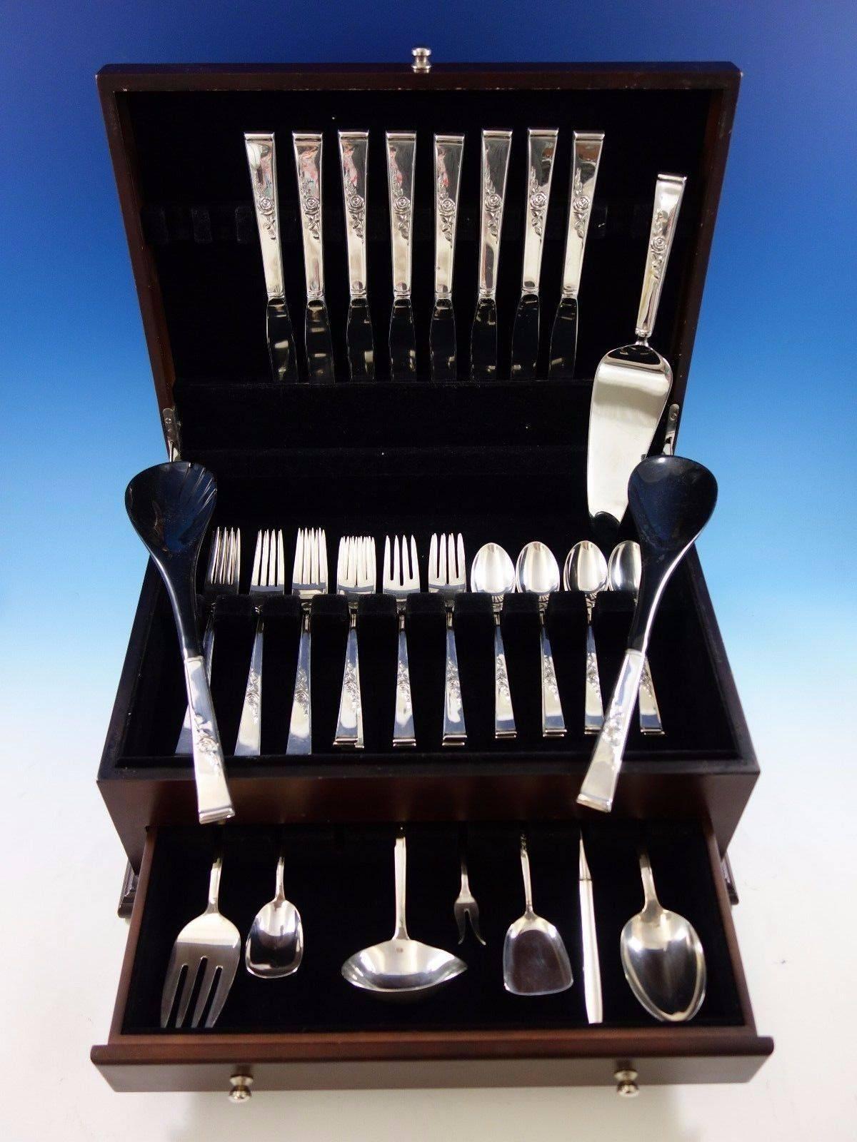 Classic rose by Reed & Barton sterling silver flatware set of 42 pieces. This set includes: 
eight knives, 9 1/8