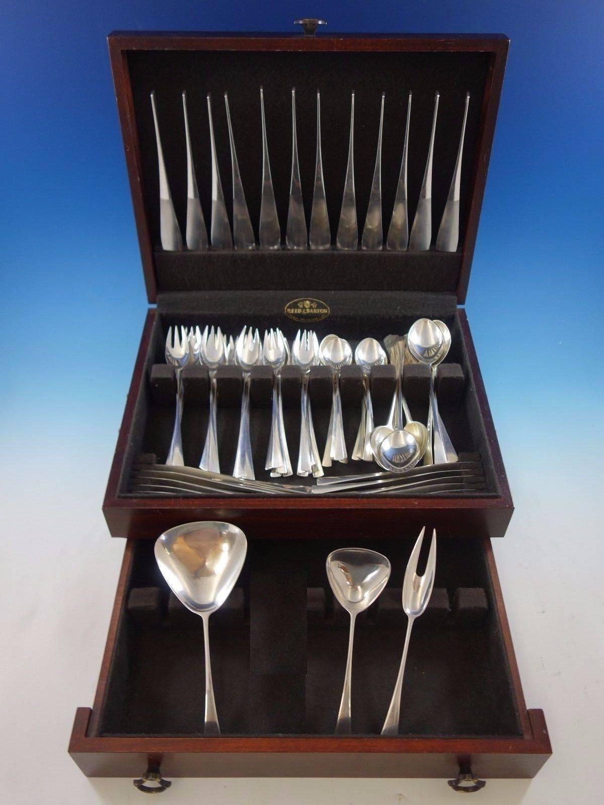 Tjorn by Dansk sterling silver flatware set, 75 pieces. This set includes: 12 dinner knives, 8 1/2", 12 dinner forks, 7 1/2", 12 salad forks, 6 7/8" , 12 teaspoons, 6", 12 place soup spoons, 7 1/2", 12 flat handle butter