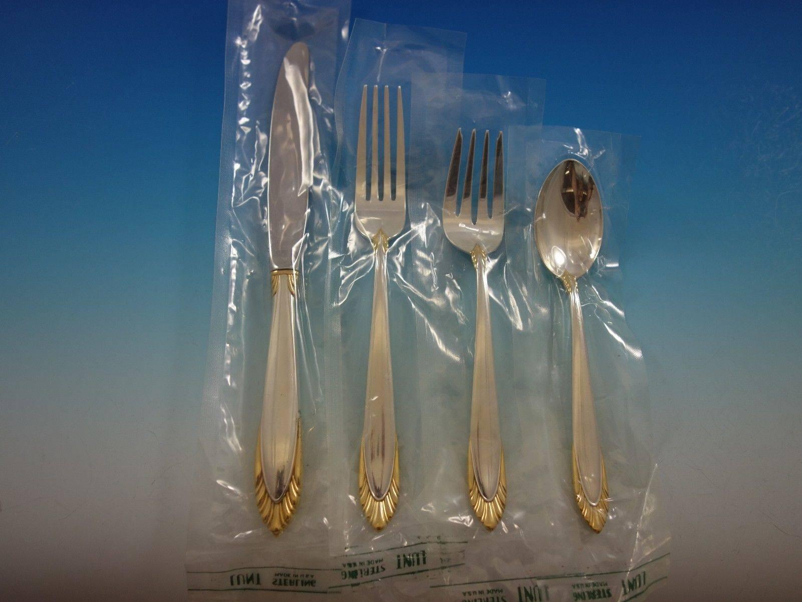 New Soliel Gold accent by Lunt sterling silver flatware set, 48 pieces. This set includes: 12 knives, 9 1/8