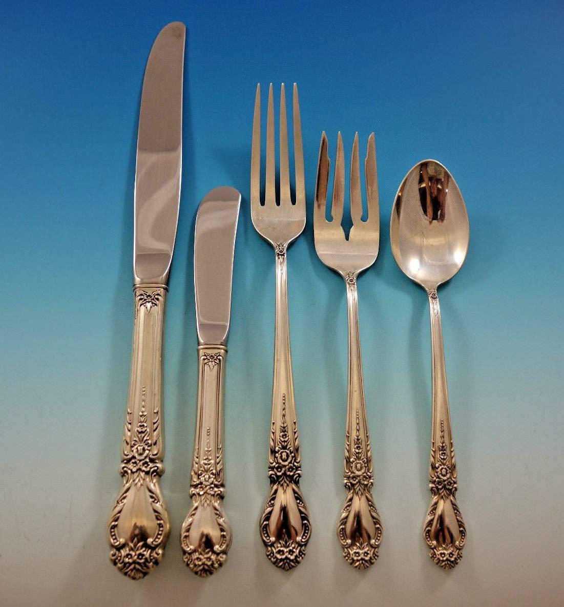 Brocade by International sterling silver flatware set, 65 pieces. This set includes: 

12 regular knives, 9 1/4