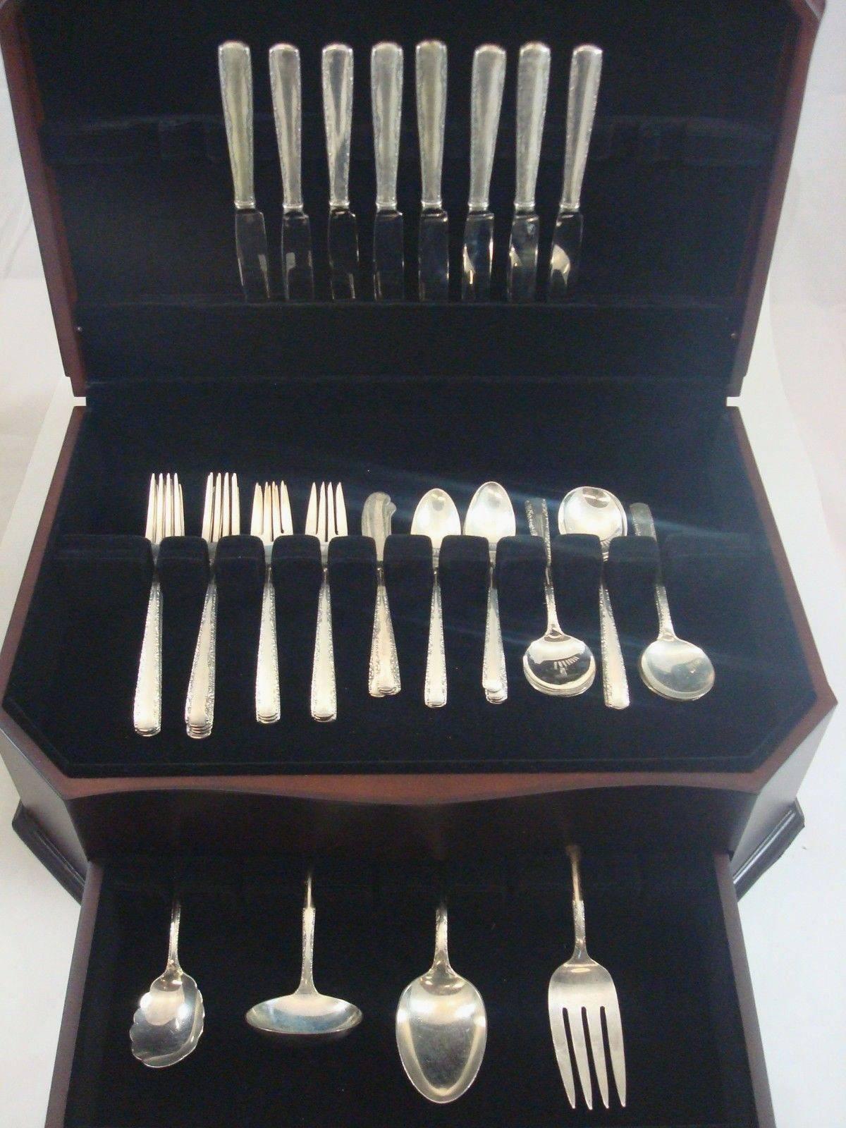 Camellia by Gorham sterling silver flatware set of 52 Pieces. This set includes: 

Eight knives, 8 3/4