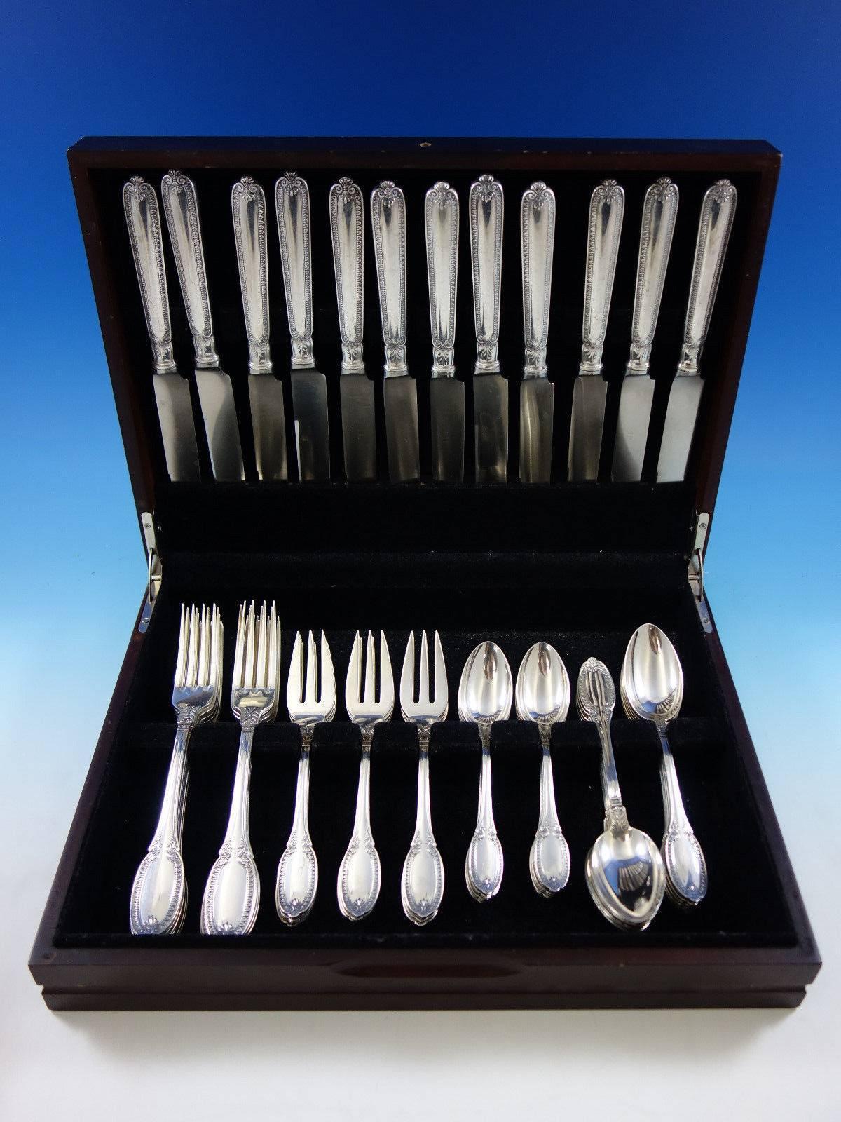 This 60-piece sterling silver Empire by Buccellati set includes: 12 dinner size knives, 9 7/8