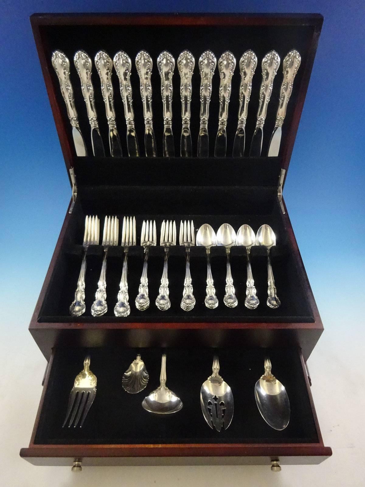 Old Atlanta by Wallace sterling silver flatware set for 12 service of 53 pieces. This set includes: 

12 place size knives, 9