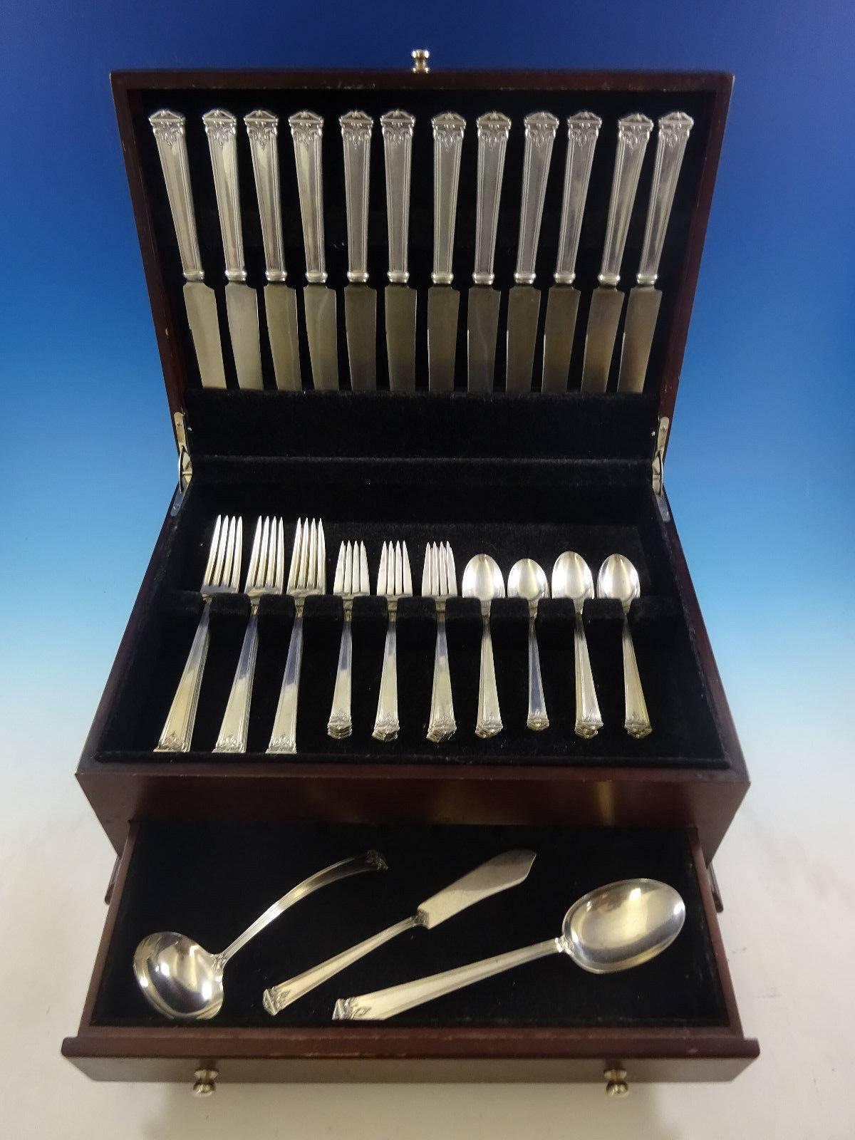 Dinner size Trianon by international sterling silver flatware set, 51 pieces. This set includes: 

12 dinner size knives, 9 1/2