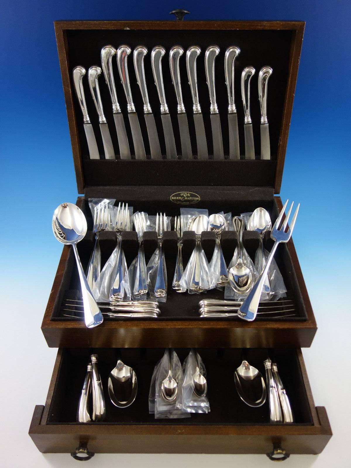 Queen Ann by Worcester (England) sterling silver dinner size flatware set of 68 pieces. This set includes: 

Eight dinner size knives, pistol grip, 9 3/4
