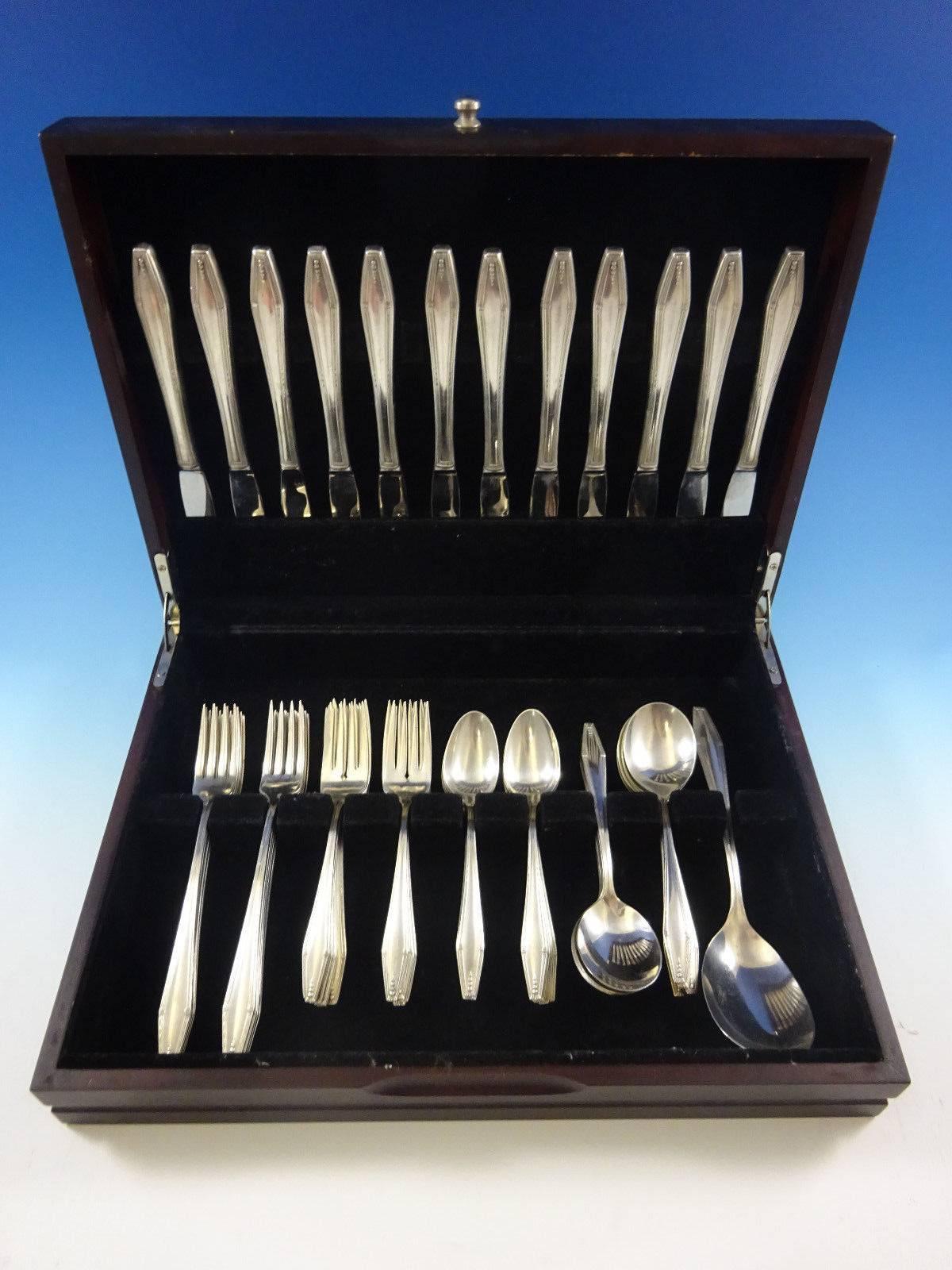 Formality by State House sterling silver flatware set, 61 pieces. This set includes: 

12 knives, 8 1/2