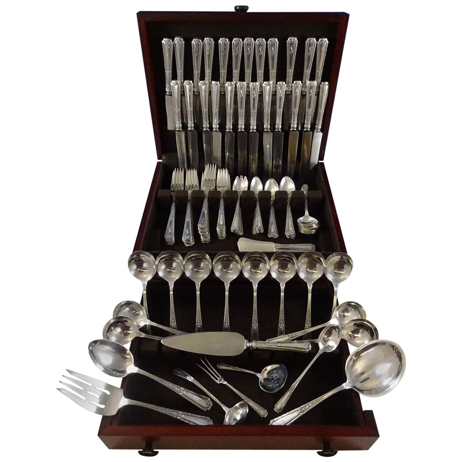 Louis XIV by Towle Sterling silver dinner and luncheon flatware set of 142 pieces with "M" monogram. This set includes: 12 dinner size knives, 9 1/2", 12 dinner size forks, 7 7/8", 12 luncheon knives, 8 5/8", 12 luncheon