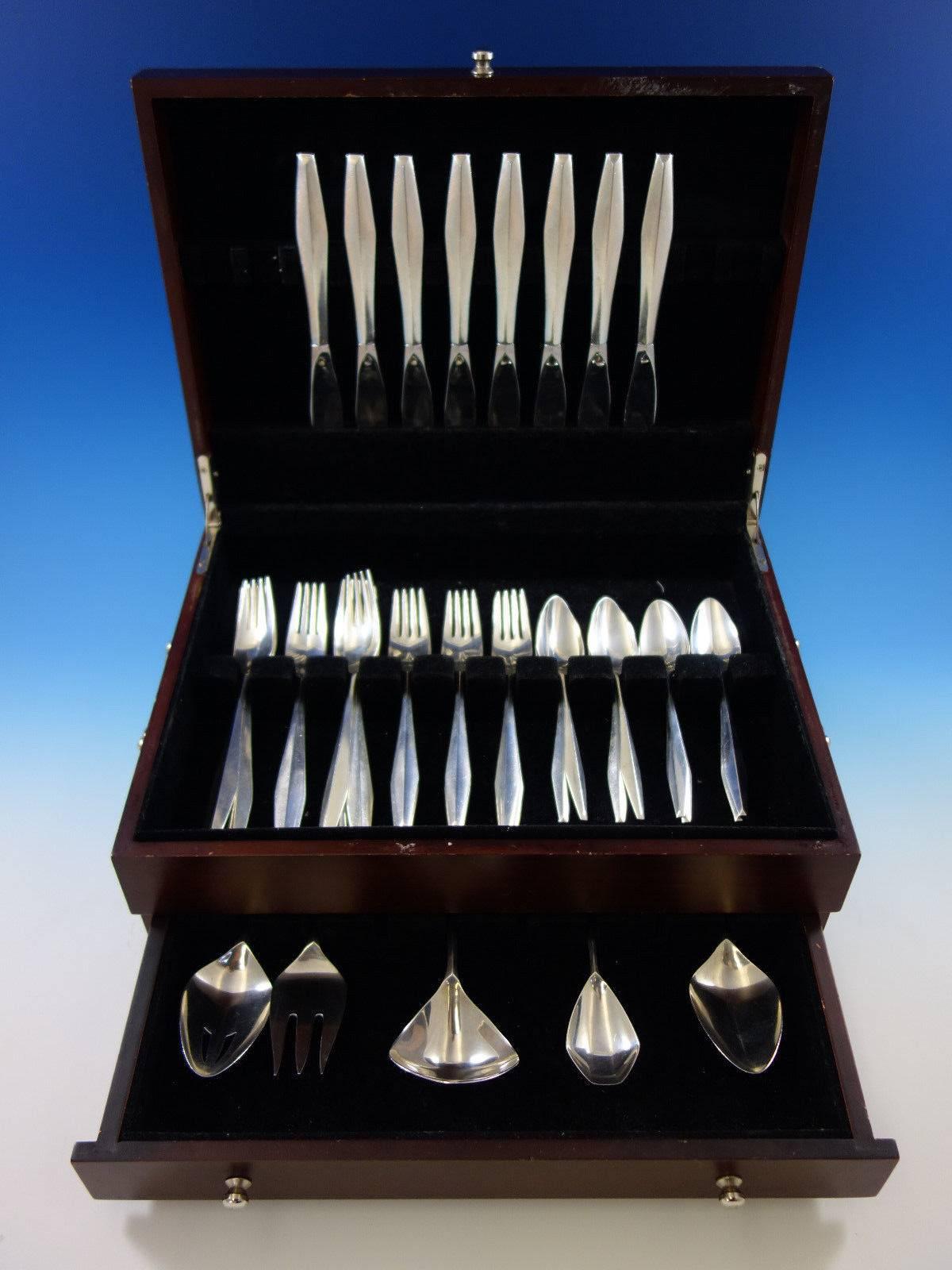 Mid-Century Modern diamond by Reed & Barton sterling silver flatware set of 37 pieces. This set includes: Eight knives, 8 7/8